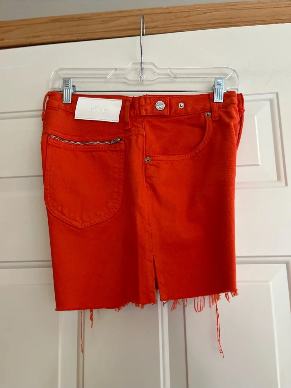 Women’s 7 for all Mankind Easy Ruby Orange raw hem button fly Jean short.Size 26